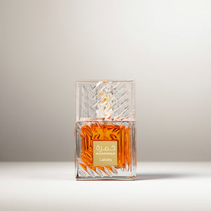 Khamrah perfume with bergamot, cinnamon, nutmeg, dates, praline, lily, jasmine, vanilla, roasted tonka, amber, myrrh, benzoin, and agarwood
