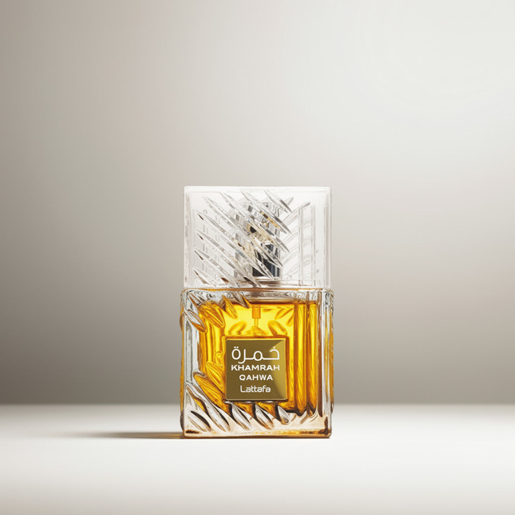 Khamrah Qahwa perfume with ginger, cinnamon, cardamom, praline, candied fruits, white flowers, coffee, tonka, vanilla, benzoin, and musk
